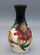 Moorcroft Pottery, Anna Lily pattern small vase with elongated neck, designed by Nicola Slaney,