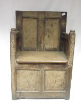 19th century oak box seat chair, panel back and seat cover, frame carved with Celtic strapwork,