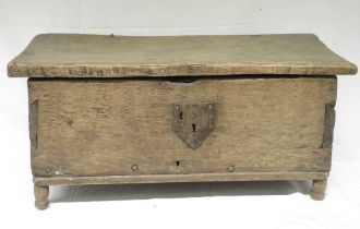 Small boarded oak country made coffer, with split pin hinged top, on later turned supports, W75cm