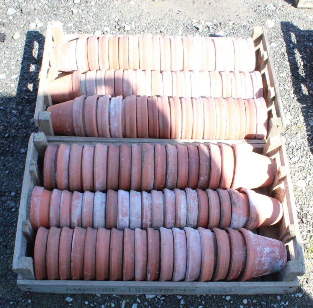 (Large quantity). Two crates of circa 1930s terracotta plant pots. Sizes 5 and 5 1/2 inch