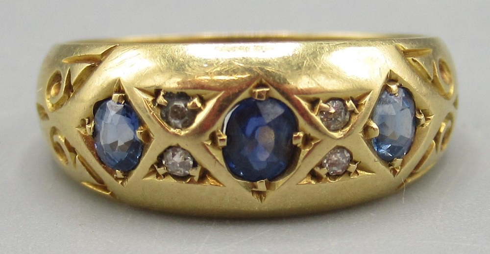 Victorian 18ct yellow gold ring set with three sapphires separated by smaller diamonds, stamped - Image 2 of 2