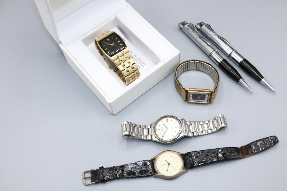 Accurist gold plated quartz wristwatch, signed black dial, baton hour indices, centre seconds,
