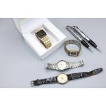 Accurist gold plated quartz wristwatch, signed black dial, baton hour indices, centre seconds,