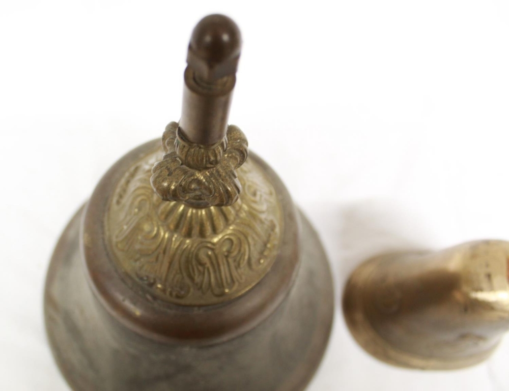 Large brass bell with ornate headstock, lacking original clapper, and a small brass bell casing, - Image 2 of 3