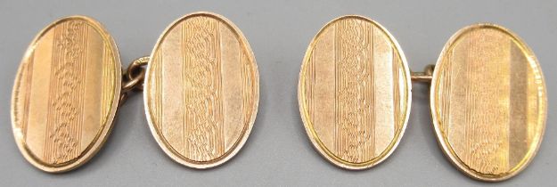 Pair of 9ct yellow gold cufflinks with engine turned design, stamped 375, 8.2g