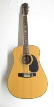 Harmony Model no. H 6860-12, 12 string acoustic guitar, lacking 1 string (Victor Brox collection)