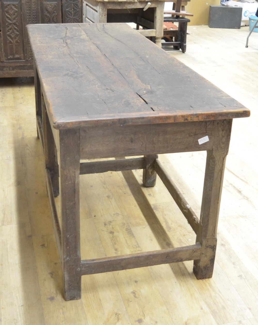 Oak refectory style dining table, rectangular two piece top on six faceted supports joined by - Image 4 of 4