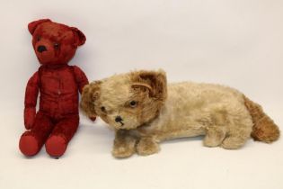 Mid C20th pyjama case in the form of a dog, with zipper to side, and a mid 20th century red teddy