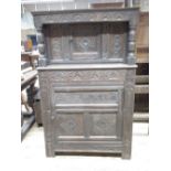 Small oak court cupboard, with lozenge caved panels, arcades and stylized foliage, W94cm D46cm