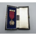 Transport and general workers union badge, 1945-1973, 9ct gold and enamel, presented to BRO.A.CROOKS