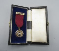 Transport and general workers union badge, 1945-1973, 9ct gold and enamel, presented to BRO.A.CROOKS