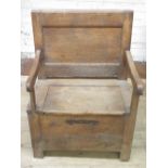 19th century Country made pine box seat arm chair, metal hinged seat with panel back, W66cm D48cm