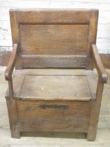19th century Country made pine box seat arm chair, metal hinged seat with panel back, W66cm D48cm