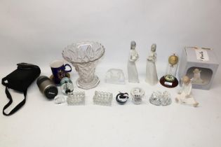 Mixed collectables incl. four paperweights, Nikon 70-300mm camera lens, glass vase, crystal swans,