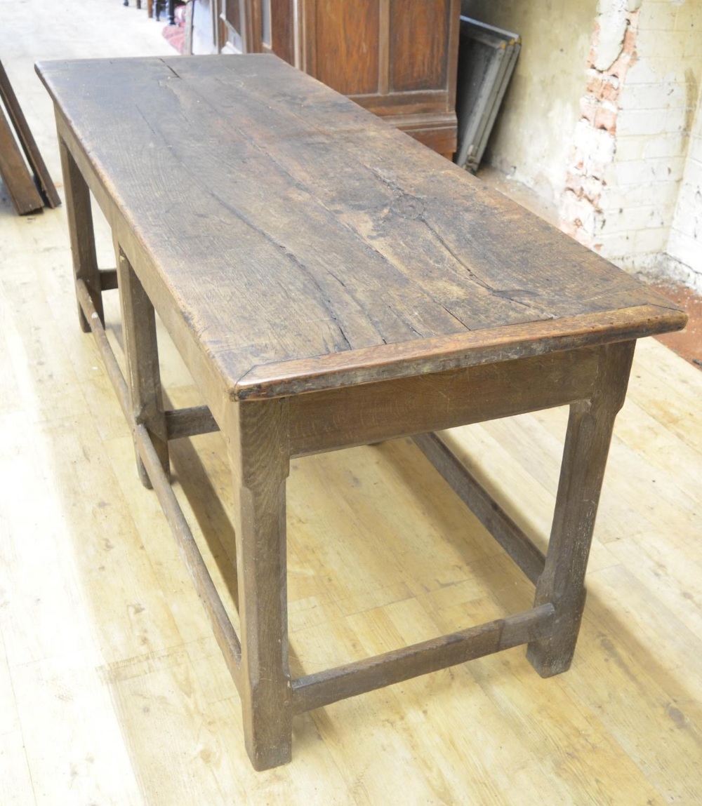 Oak refectory style dining table, rectangular two piece top on six faceted supports joined by - Image 3 of 4
