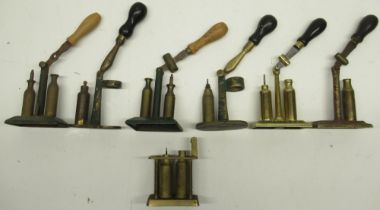 Seven late 19th century and later brass decapper and priming tools