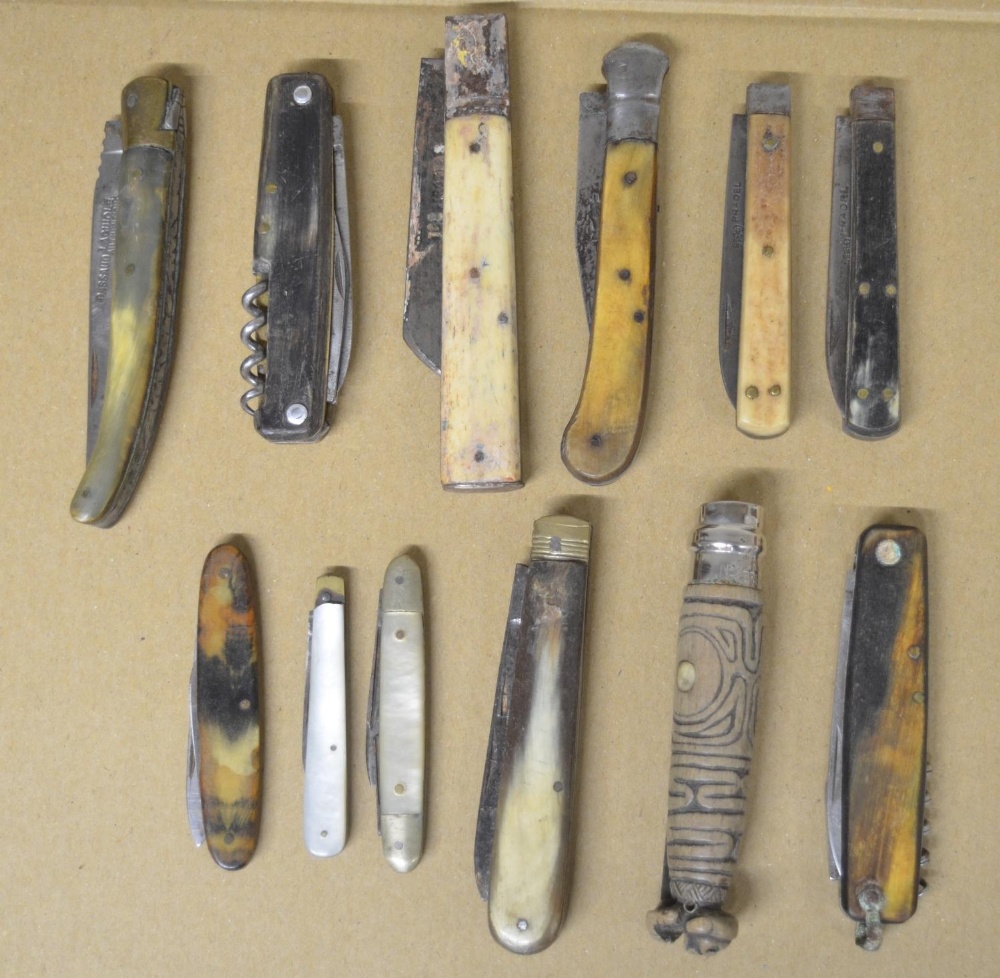 Collection of 12 pocket knives of various styles including bone, horn and mother of pearl handled