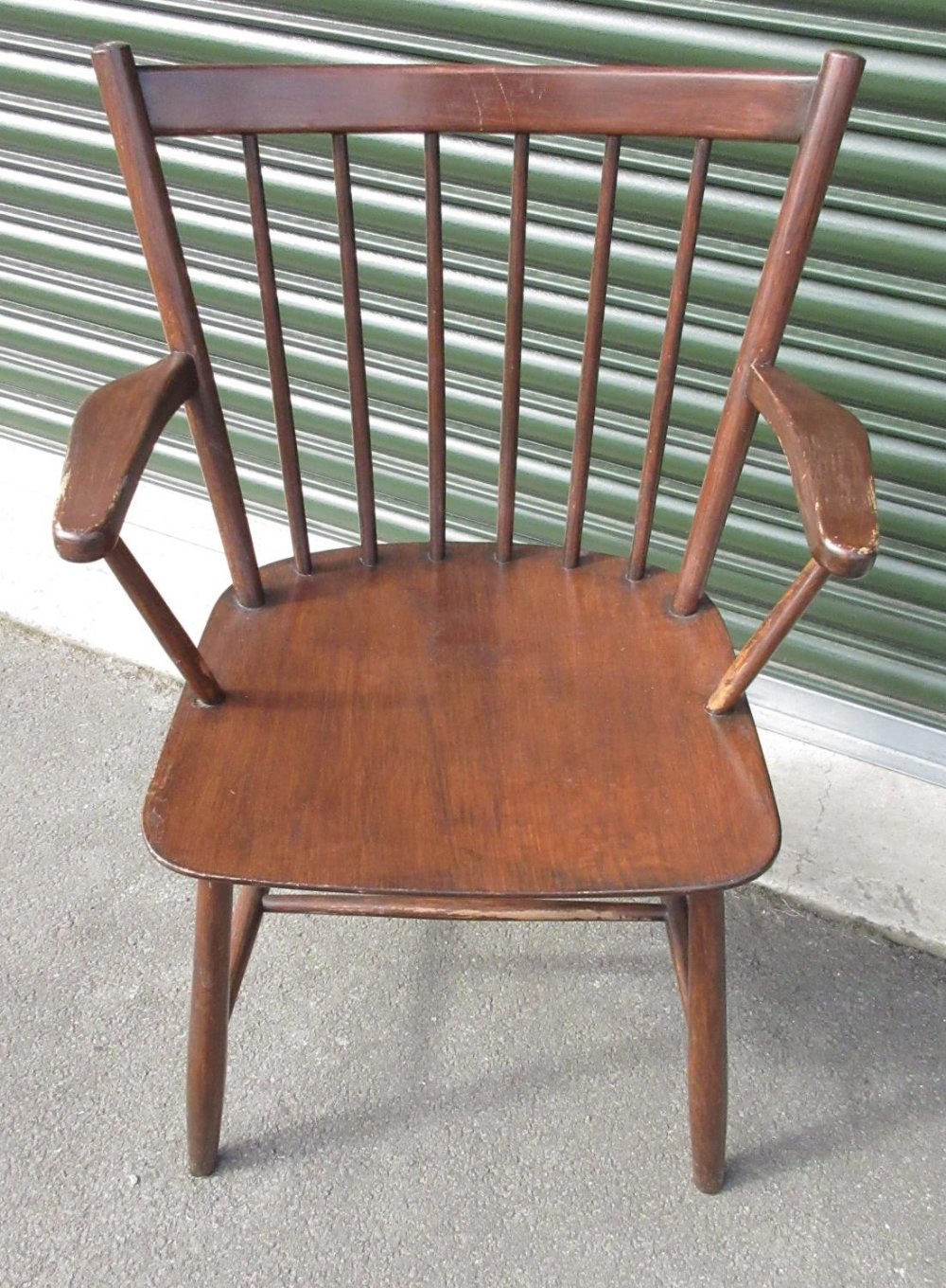 Mid-Century Danish elbow chair, curved stick back on tapering supports with stretcher, stamped