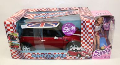 Sindy boxed Mini Cooper and a boxed early 2000s Sindy and baby