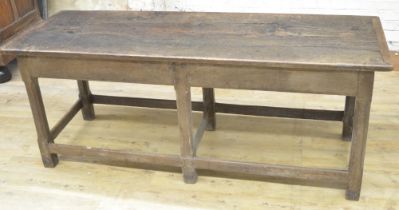 Oak refectory style dining table, rectangular two piece top on six faceted supports joined by