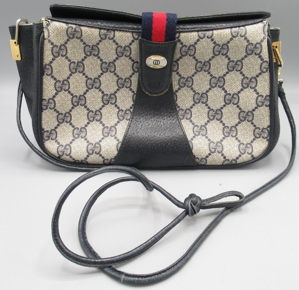 Gucci cross body bag, serial number 1002024, navy colourway, W 26cm, with branded dust bag
