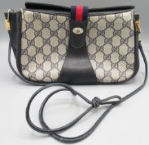 Gucci cross body bag, serial number 1002024, navy colourway, W 26cm, with branded dust bag