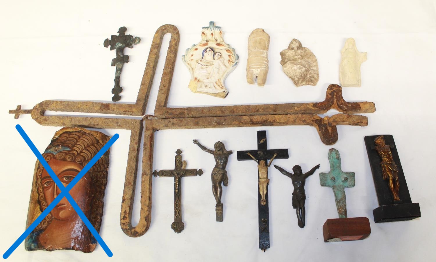 Collection of religious fragments of various ages and styles, to include a copper alloy cruciform br