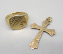 9ct gold signet ring set sing half engraved design and single diamond, and a 9ct gold cross