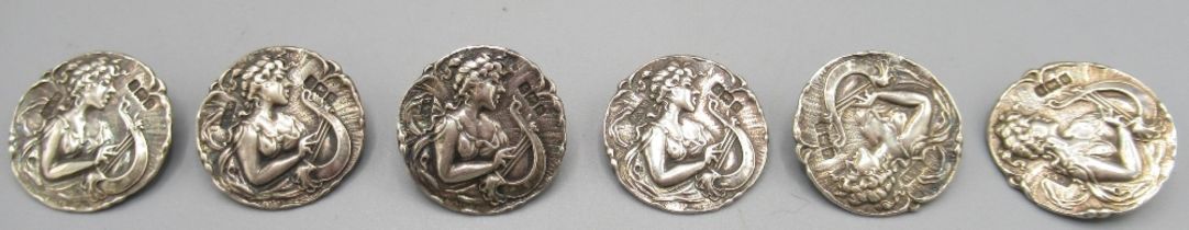Set of six Art Noveau silver buttons with classical female design, by Reynolds & Westwood,