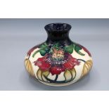 Moorcroft Pottery, Anna Lily pattern squat vase, designed by Nicola Slaney, H11cm