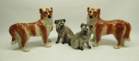 Pair of Bo'ness pottery style models of standing dogs decorated in red and white, and a pair of