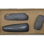 Three neolithic stone hand axe heads, largest L18cm (Victor Brox collection)