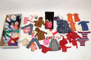 Large collection of dolls clothes and shoes including modern and vintage Sindy