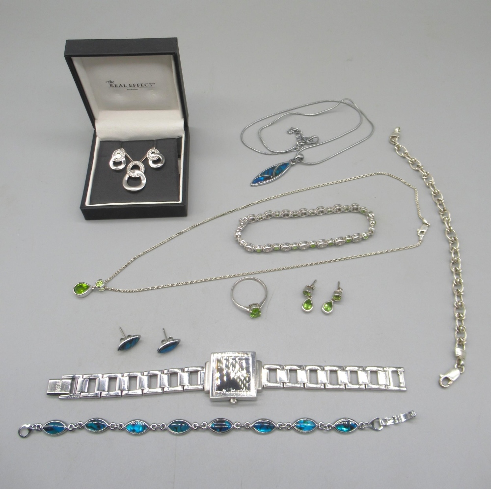 Silver drop pendant necklace set with green stones, matching earrings and ring, and a similar - Image 3 of 9