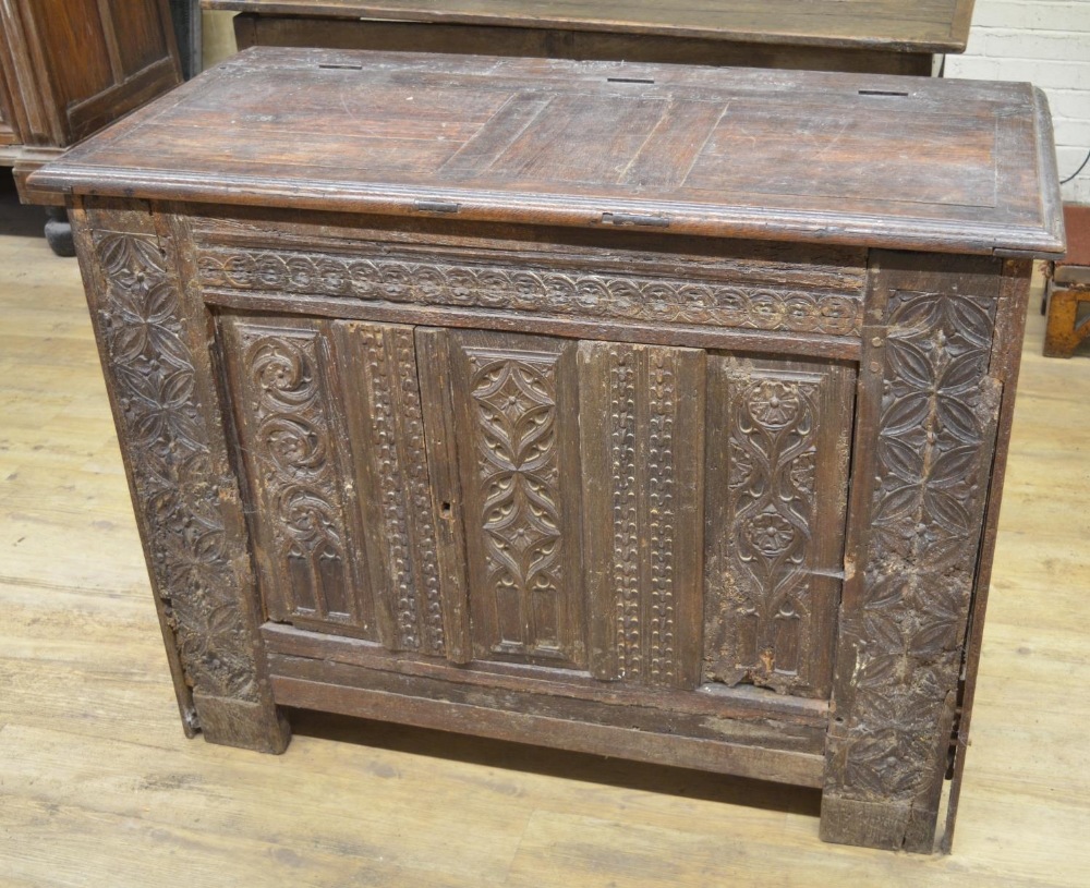 18th century French oak side cabinet, hinged top above two doors carved with strapwork, W129cm D63cm