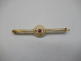 9ct yellow gold bar brooch set with pink stone and seed pearl cluster, stamped 9ct, 3.3g