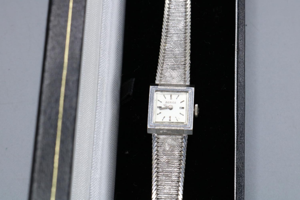 Ladies Berios 18ct white gold wristwatch on integrated polished and engraved bracelet, hallmarked