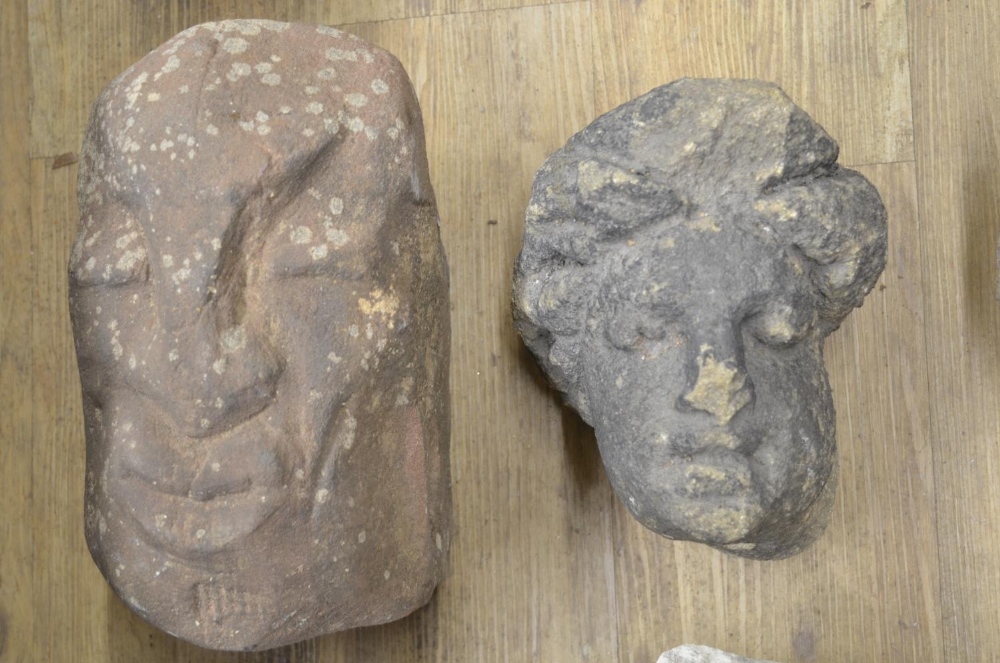 Collection of carved stoneware to include faces, a wolf head, one composite head on plinth, etc. ( - Image 4 of 8