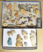 Collection of historical stone and clay figures and other items including a Pre BC Mayan figure,