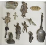 Collection of historical cast metal figures including a Celtic bronze figure holding a Dolphin (with