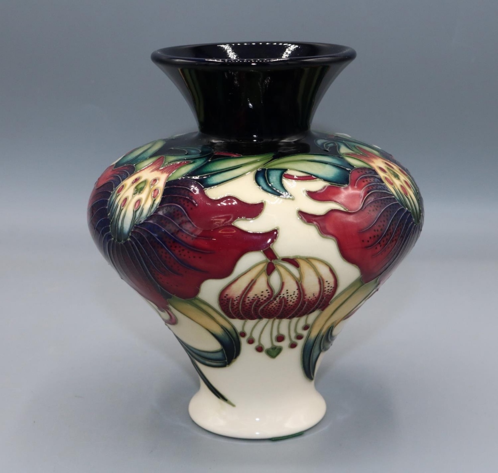 Moorcroft Pottery, Anna Lily pattern vase with trumpet neck, designed by Nicola Slaney, H15.5cm - Image 2 of 3
