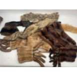 Two brown fur stoles with mink tails, one labelled Walter Kerner, three fur scarves, and a mink