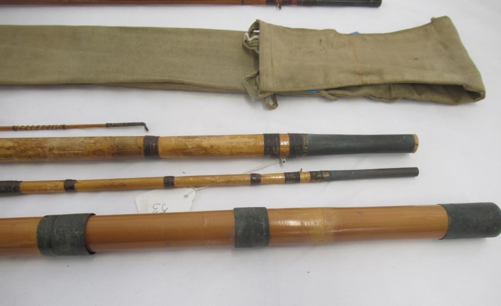 A pair of vintage fishing rods. To include a split cane three-section fly rod sold by the A.W. - Image 3 of 6