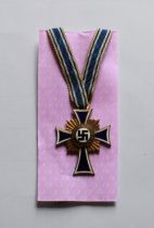 Gold Mothers Cross 1st Class. In excellent condition with long ribbon and engraving to back.