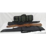 Collection of four gun slips. To include a full leather gun slip measuring 123cm, and three canvas