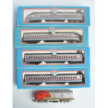 HO gauge Model Power Amtrak bullet train with power and dummy cars plus 2 coaches, all boxed with