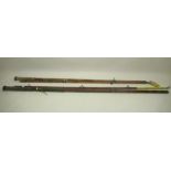 A pair of unmarked circa 1920s bamboo 'Tunny' tuna fishing rods, likely originating from