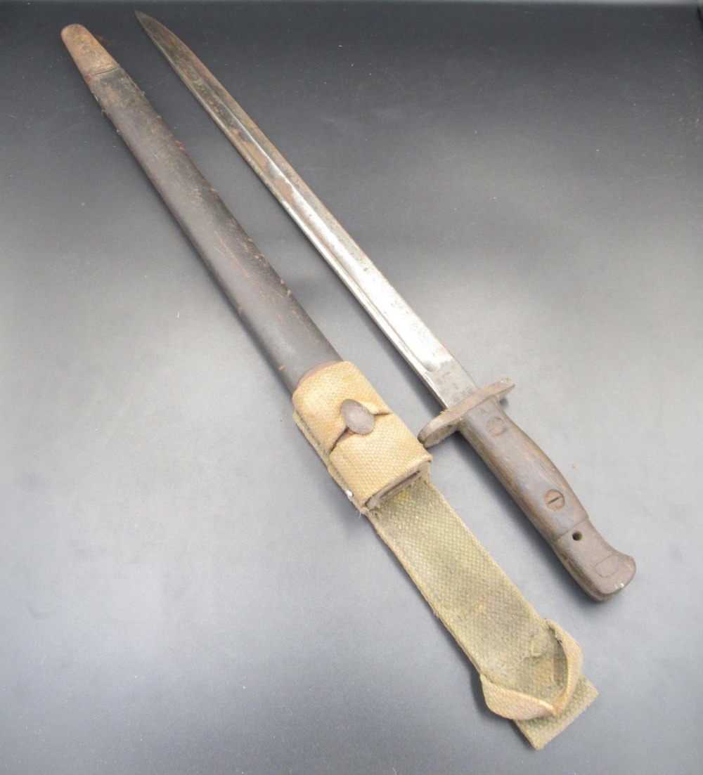 British 1907 pattern bayonet, manufacturer unknown. Complete with original scabbard and canvas