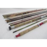 Selection of four vintage fishing rods, all with signs of age-related wear. To include two