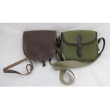 A pair of unbranded cartridge bags. To include a leather bag with dual compartments, in good